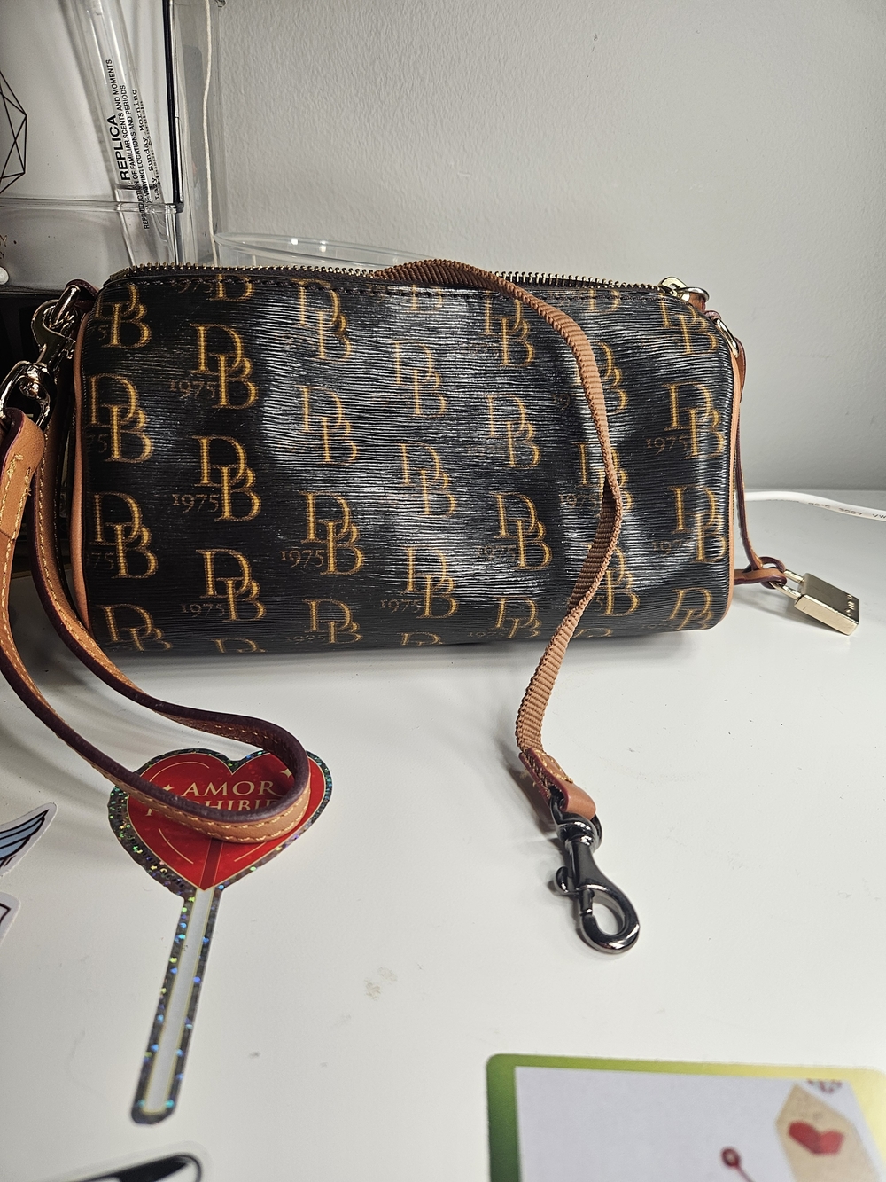 Dooney & Bourke -DB Pattern Brown and Beige Cosmetic Bag W/ Key Leash